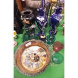 A pair of Bohemian blue overlaid cut glass decanters,