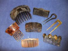 A collection of tortoiseshell and other hair combs