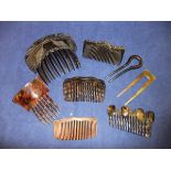 A collection of tortoiseshell and other hair combs