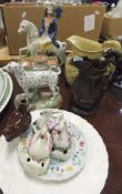 A collection of Staffordshire and other wares to include a 19th Century Staffordshire figure of a