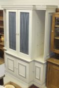 A modern painted breakfront side cabinet,