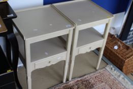A pair of OKA grey painted two tier side tables with three-quarter galleried tops and single drawer