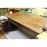 A 19th Century French cherrywood farmhouse kitchen table,