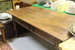 A 19th Century French cherrywood farmhouse kitchen table,