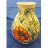 A Moorcroft vase decorated with poppies, inscribed to base "Trial 14.3.