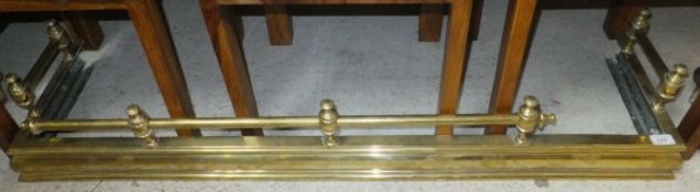 A brass fire kerb