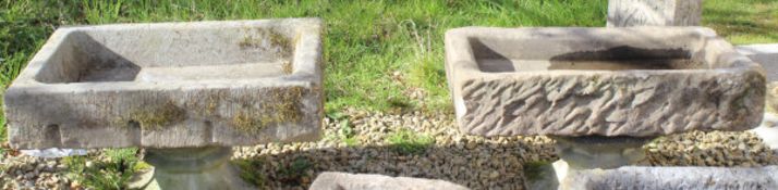 A pair of composite stone rectangular troughs,