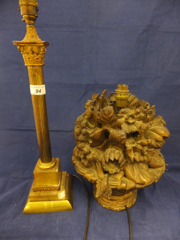 A brass table lamp in the form of a Corinthian column,