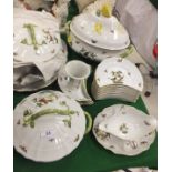 A collection of Herend porcelain dinner wares decorated with birds and insects,