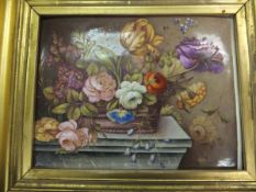 An early 19th Century rectangular ceramic tile painted with a basket containing flowers,