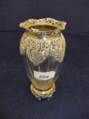 A Victorian pierced silver mounted glass vase of squash form, the piercing of floral spray design,