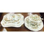 A collection of Copelands Spode dinner wares decorated in the Oriental taste in amber and green to