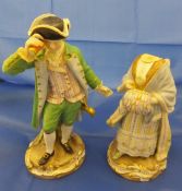 A pair of 19th Century Meissen porcelain figures of a lady and gentleman,