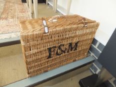 A Fortnum & Mason cane hamper