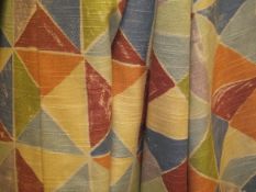 Two pairs of cotton interlined curtains of harlequin style checked pattern design,