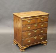 A George III mahogany bachelor chest,