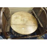 A 19th Century oak oval snap top table,