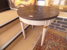 A pair of circular side tables in the Shabby Chic taste with distressed black painted circular tops