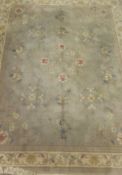 A Chinese superwash rug in light grey,