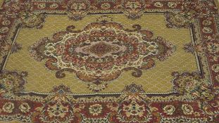 A Caucasian rug with central lozenge in reds, creams and black on a mustard ground,