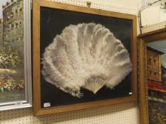 A Victorian mother of pearl stick ostrich feather fan,