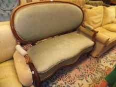 A mahogany framed serpentine fronted two seater sofa with green diamond patterned upholstered seat,