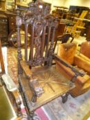 A Victorian Gothic oak hall chair in the 17th Century manner,