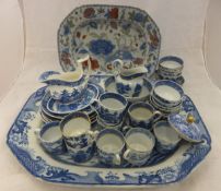 An early 19th Century Mason's Ironstone "Willow" pattern blue and white elongated platter,