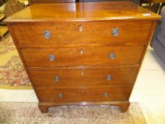 A 19th Century mahogany chest of four long graduated drawers on bracket feet