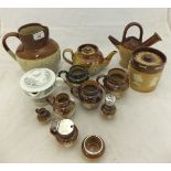A collection of Doulton and other stoneware to include a Charles Haskings Poultry Cross,