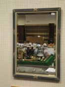 A rectangular bevel edged wall mirror with blue painted frame