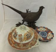 A 19th Century Japanese figural decorated tureen and cover bearing six character mark to base,