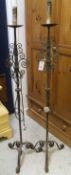 A pair of 20th Century wrought iron standard lamps of candle form