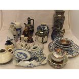 A collection of various Chinese and Japanese pottery and porcelain to include two Ming style deep