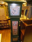 A modern green painted long case clock with floral spray decoration bearing name "Thomas Kent