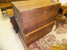 Two early 20th Century Colonial Iroko trunks with wrought iron carrying handles