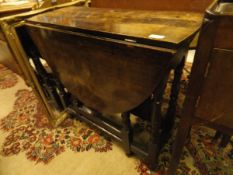 An 18th Century oak gate-leg table (with alterations)