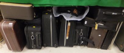 Nine various suitcases