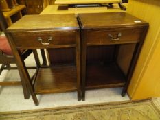 A pair of early 20th Century mahogany bedside tables with single drawers on square supports united