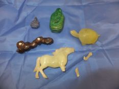 A Chinese carved jade figure of a horse with a wooden stand, a carved jadeite figure of a tortoise,