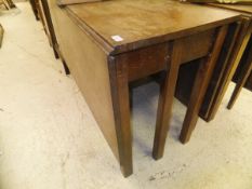 A George III mahogany rectangular drop-leaf dining table on square moulded and chamfered supports