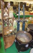 A 19th Century oak corner three tier graduated shelf unit with relief and scroll carved decoration