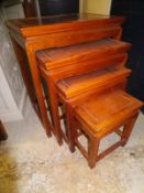 A Chinese hardwood serving table with three drawers,