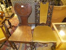 An early Victorian mahogany panel seated hall chair and a Victorian carved rosewood salon chair