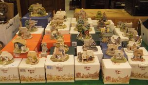 A collection of 30 various Liliput Lane cottage ornaments with boxes