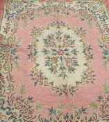 An Oriental carpet in the Aubusson manner with a looped pile,