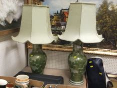 A collection of items comprising two modern Oriental table lamps,