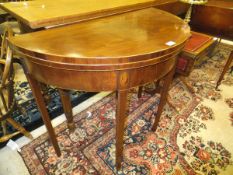 A 19th Century mahogany and inlaid demi-lune card table,