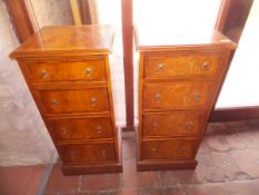 A pair of slim flame mahogany and crossbanded chests of four drawers in the 19th Century style,