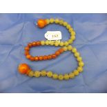 A string of Chinese jade and carnelian prayer beads